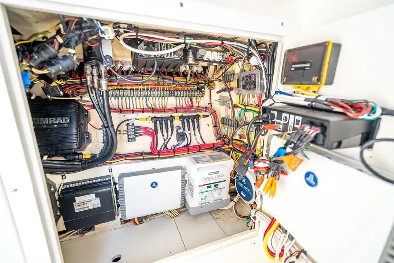 Slide: The Image of Electrical system of a 2014 SeaVee 34 boat, showcasing wiring and components. - 28