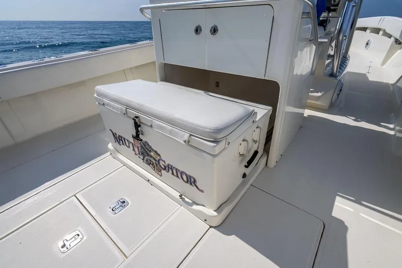 Slide: The Image of 2014 SeaVee 34 boat interior with storage and cooler on deck. - 40