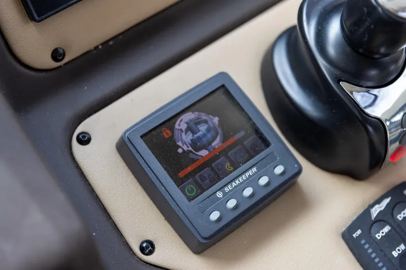 Slide: The Image of Seakeeper control panel on 2014 Azimut 54 Flybridge yacht dashboard. - 18