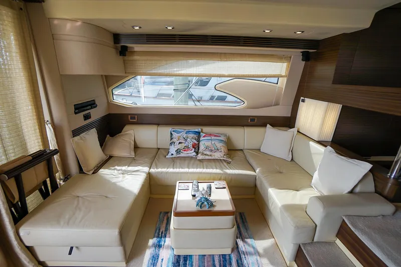 Slide: The Image of Luxurious interior of 2014 Azimut 54 Flybridge yacht with plush seating and elegant decor. - 32