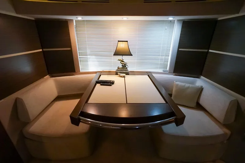 Slide: The Image of Luxurious interior of 2014 Azimut 54 Flybridge yacht with elegant seating and table. - 41