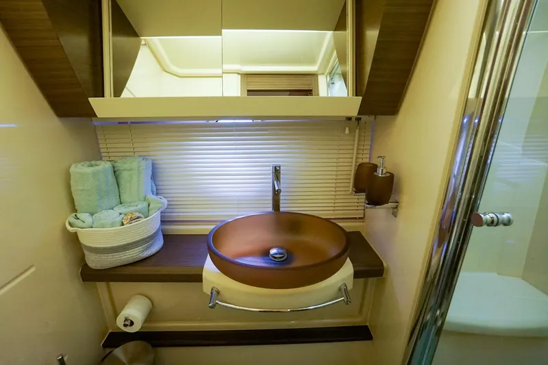 Slide: The Image of Luxurious bathroom in 2014 Azimut 54 Flybridge yacht with modern sink and elegant decor. - 42