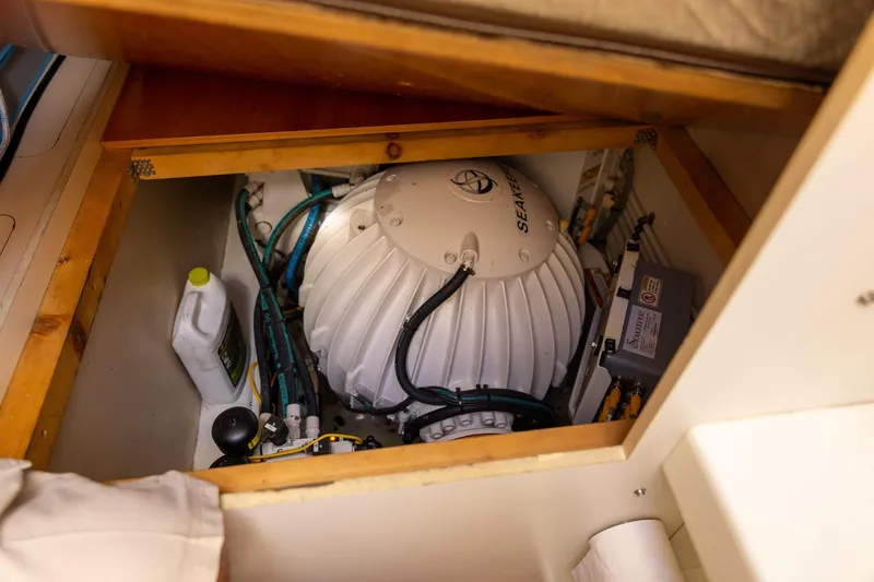 Slide: The Image of Engine compartment of 2014 Azimut 54 Flybridge with Seakeeper stabilizer system. - 91