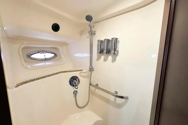 Slide: The Image of Luxurious shower in 2006 Sea Ray 580 Sedan Bridge yacht with modern fixtures. - 16