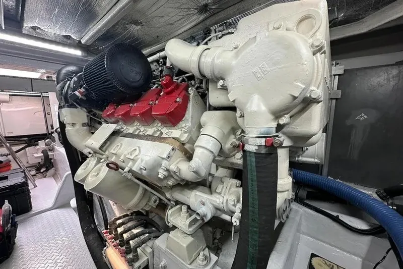 Slide: The Image of Engine room of a 2006 Sea Ray 580 Sedan Bridge yacht, showcasing a powerful engine. - 34