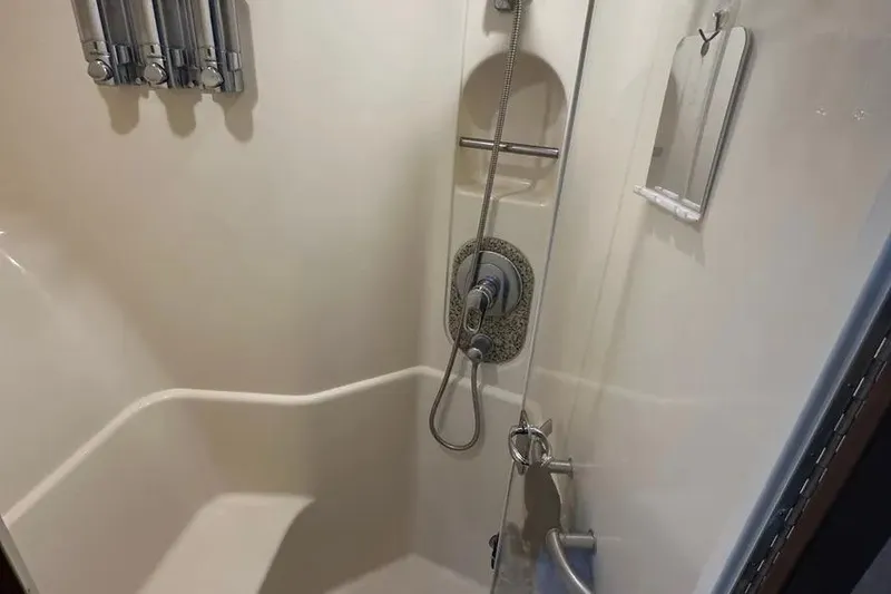 Slide: The Image of Shower area in 2006 Sea Ray 580 Sedan Bridge yacht, featuring modern fixtures. - 51