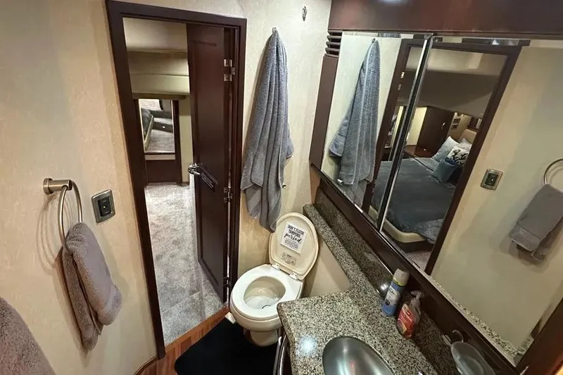 Slide: The Image of Luxurious bathroom interior of 2006 Sea Ray 580 Sedan Bridge yacht. - 52