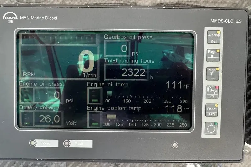 Slide: The Image of Display panel of 2006 Sea Ray 580 Sedan Bridge showing engine metrics and running hours. - 58