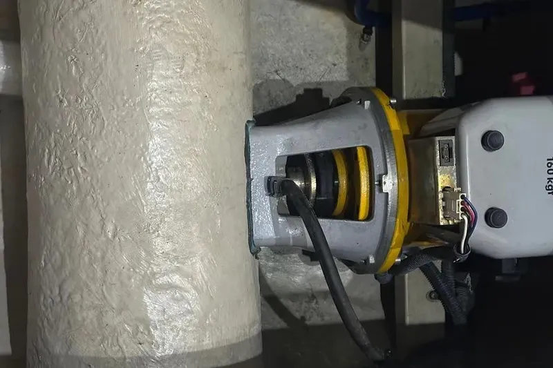 Slide: The Image of Engine component of a 2006 Sea Ray 580 Sedan Bridge yacht, featuring mechanical and electrical parts. - 64