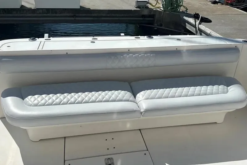 Slide: The Image of Luxury seating on 2006 Sea Ray 580 Sedan Bridge yacht, docked at marina. - 70