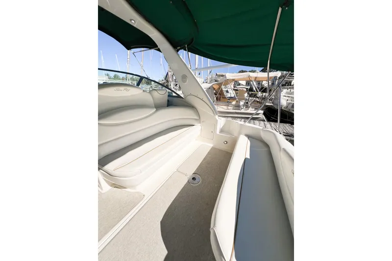 Slide: The Image of Interior view of a 2000 Sea Ray 340 Sundancer boat with seating and canopy. - 50