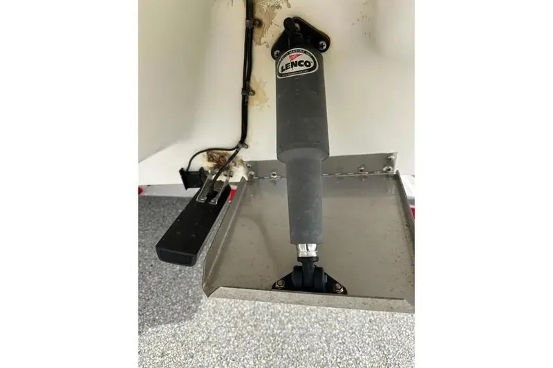 Slide: The Image of Lenco trim tab actuator on 2001 Century 2300 Center Console boat. - 11