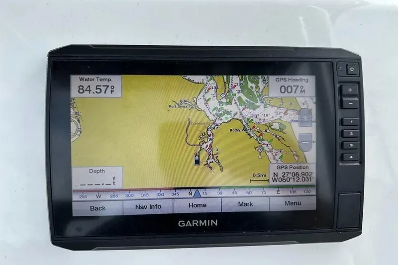 Slide: The Image of Garmin GPS display showing map and water temperature on a 2001 Century 2300 Center Console. - 7
