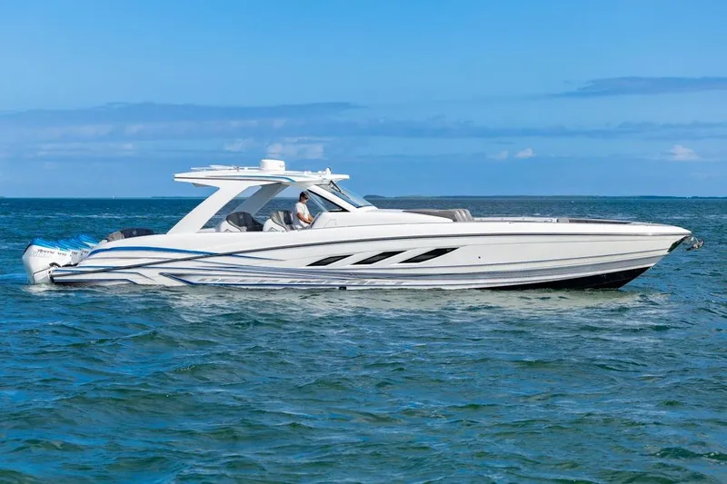 Slide: The Image of 2025 Deep Impact 499 Sport boat cruising on open water. - 10