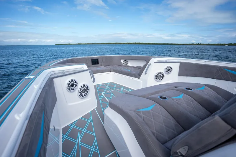 Slide: The Image of Luxury interior of 2025 Deep Impact 499 Sport boat on open water. - 17