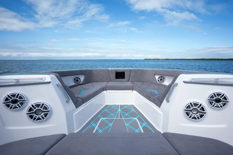 Slide: The Image of Luxury interior of 2025 Deep Impact 499 Sport boat on open water. - 18