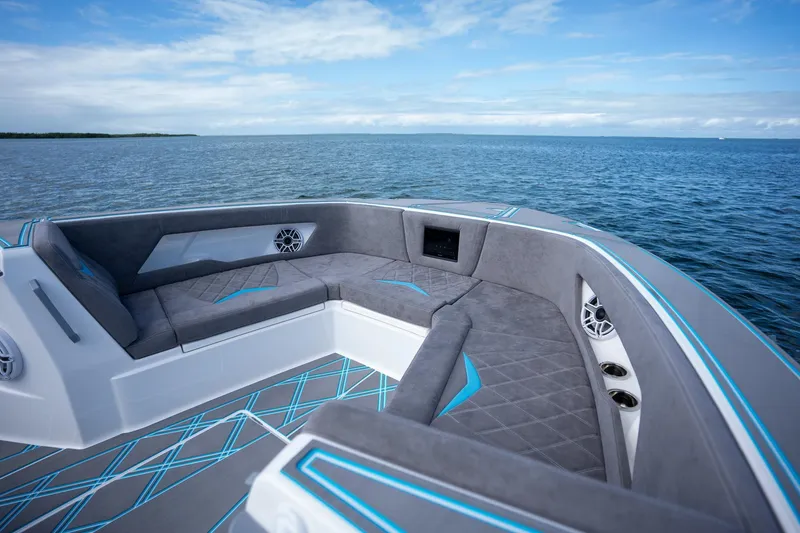 Slide: The Image of Luxurious seating on 2025 Deep Impact 499 Sport boat, with ocean view. - 19