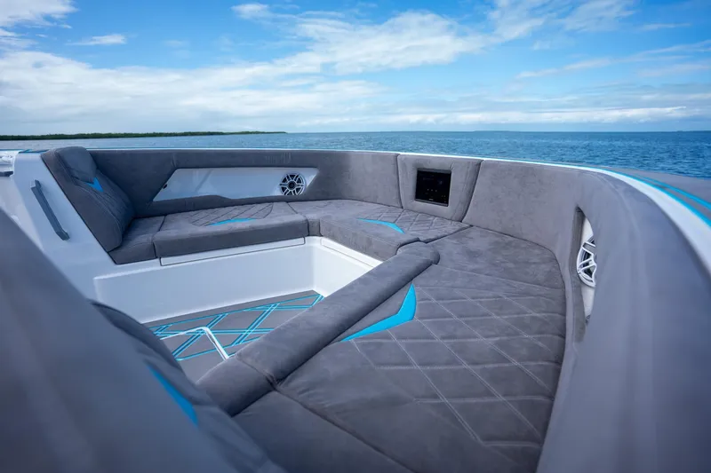 Slide: The Image of Luxurious seating on 2025 Deep Impact 499 Sport boat with ocean view. - 20