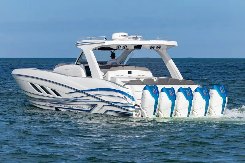 Slide: The Image of 2025 Deep Impact 499 Sport boat with multiple engines cruising on open water. - 3