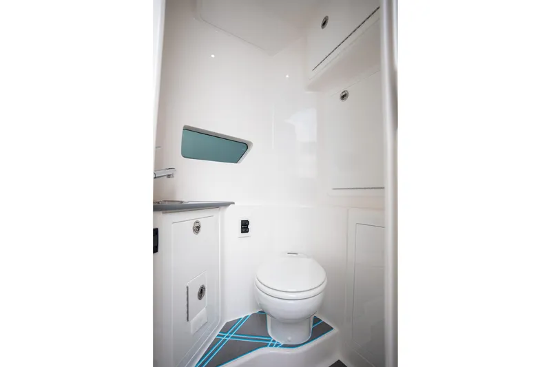Slide: The Image of Modern bathroom in 2025 Deep Impact 499 Sport boat, featuring sleek design and compact layout. - 31