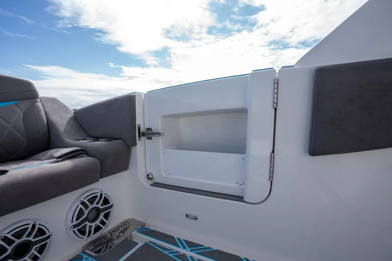 Slide: The Image of Interior of 2025 Deep Impact 499 Sport boat with seating and speakers. - 35
