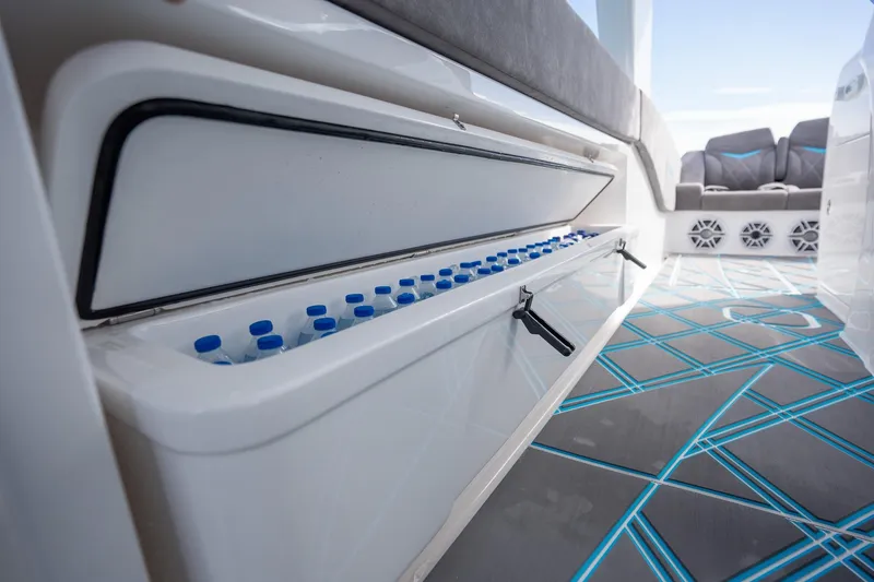 Slide: The Image of Interior of 2025 Deep Impact 499 Sport boat with built-in cooler and seating. - 45