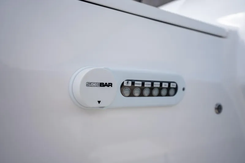 Slide: The Image of Control panel on 2025 Deep Impact 499 Sport boat, featuring sidebar buttons. - 47