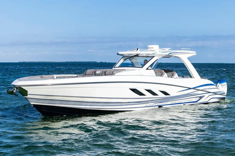 Slide: The Image of 2025 Deep Impact 499 Sport boat cruising on open water. - 6