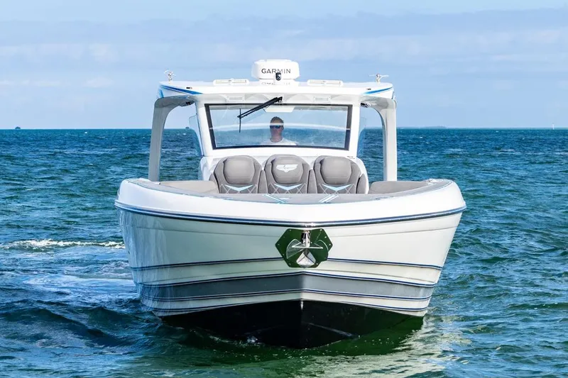 Slide: The Image of 2025 Deep Impact 499 Sport boat cruising on open water. - 7