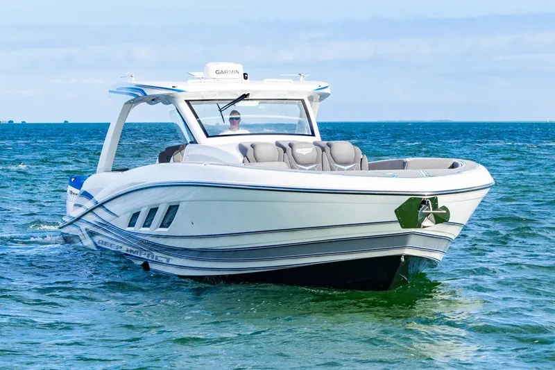 Slide: The Image of 2025 Deep Impact 499 Sport boat cruising on open water. - 8