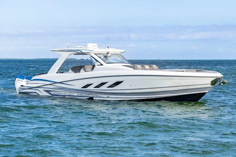 Slide: The Image of 2025 Deep Impact 499 Sport boat cruising on open water. - 9