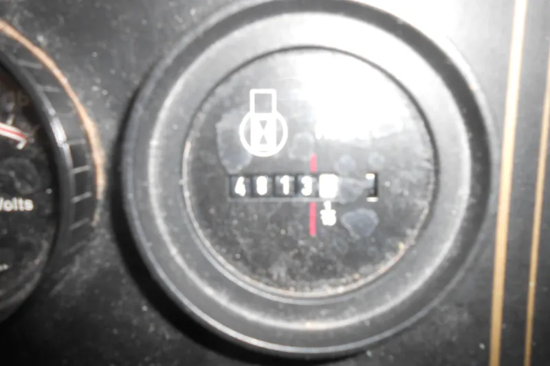 Slide: The Image of Close-up of a 1993 Stardust Cruisers 5715 dashboard gauge displaying 4813.1. - 5