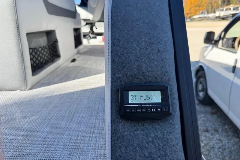 Slide: The Image of Alera M 23L 2026 interior with Bluetooth music system display. - 16