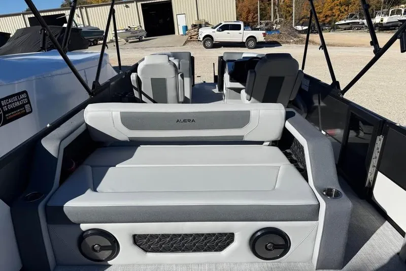 Slide: The Image of 2026 Alera M 23L boat interior with gray seating and modern design. - 7