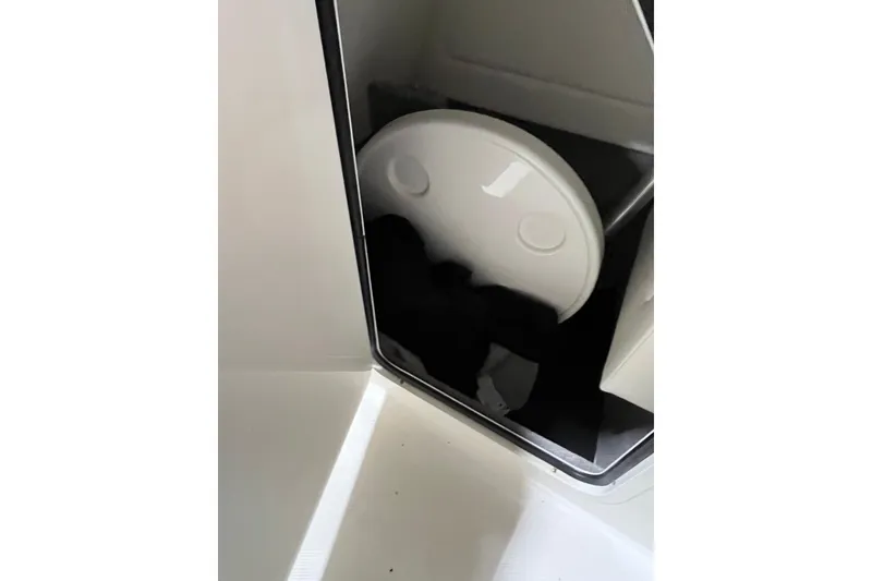 Slide: The Image of Storage compartment in 2021 Sea Ray SDX 270 Outboard boat. - 23