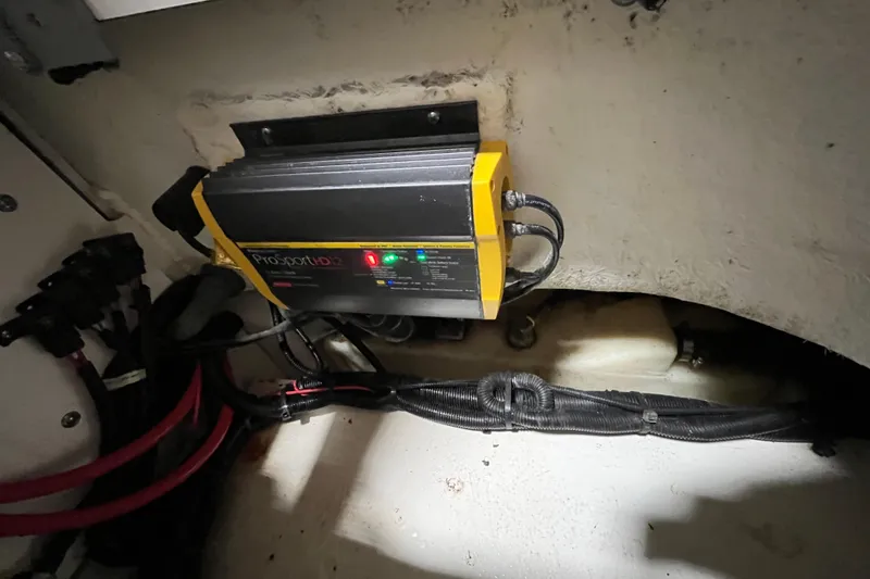 Slide: The Image of Battery charger in 2021 Sea Ray SDX 270 Outboard boat interior. - 37