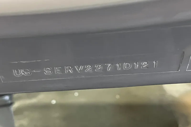 Slide: The Image of 2021 Sea Ray SDX 270 Outboard hull identification number. - 42