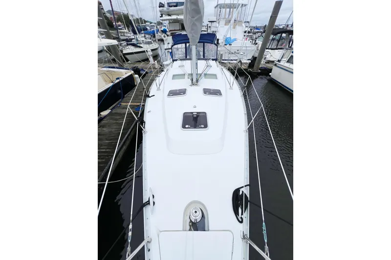 Slide: The Image of 2007 Beneteau 373 sailboat docked at marina, top deck view. - 20