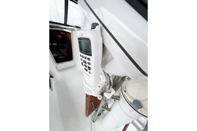 Slide: The Image of VHF radio on 2007 Beneteau 373 sailboat, mounted near cockpit entrance. - 27
