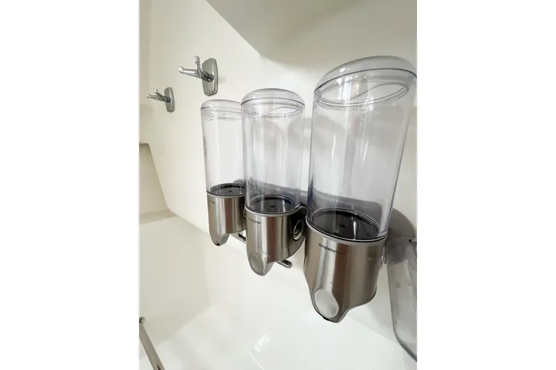 Slide: The Image of Wall-mounted soap dispensers in a Beneteau 373 yacht bathroom, 2007 model. - 59