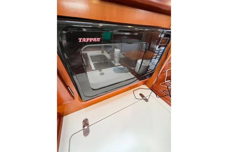 Slide: The Image of Tappan microwave in 2007 Beneteau 373 yacht kitchen interior. - 73