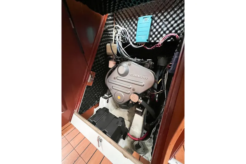 Slide: The Image of Engine compartment of a 2007 Beneteau 373 sailboat with Yanmar engine. - 76