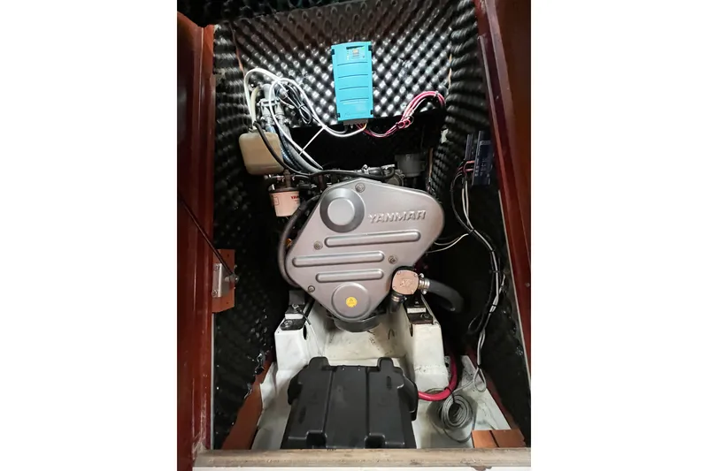 Slide: The Image of Engine compartment of a 2007 Beneteau 373 sailboat with Yanmar engine. - 77