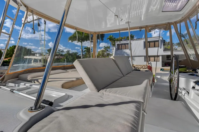 Slide: The Image of Luxurious 2021 Lagoon 46 Owner's Version catamaran interior with comfortable seating and modern design. - 32