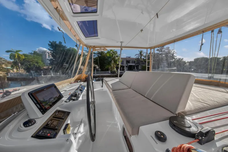 Slide: The Image of Luxurious 2021 Lagoon 46 Owner's Version yacht cockpit with modern navigation equipment. - 34