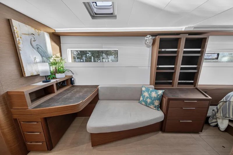 Slide: The Image of Luxurious interior of 2021 Lagoon 46 Owner's Version yacht with modern furnishings and decor. - 72