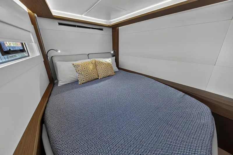 Slide: The Image of Luxurious bedroom interior of 2021 Lagoon 46 Owner's Version yacht with modern design. - 88