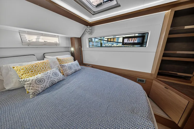 Slide: The Image of Luxurious bedroom interior of 2021 Lagoon 46 Owner's Version yacht with modern design. - 95