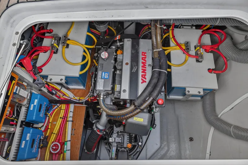 Slide: The Image of Engine compartment of 2021 Lagoon 46 Owner's Version with Yanmar engine and electrical components. - 28