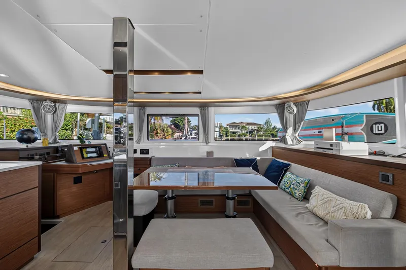 Slide: The Image of Luxurious interior of 2021 Lagoon 46 Owner's Version catamaran with modern furnishings. - 50